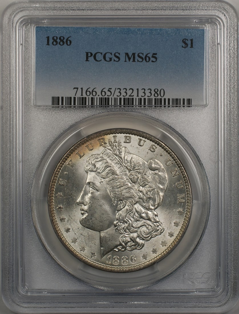 PCGS MS 65 1886 Silver Morgan Dollar Uncirculated Philadelphia Mint: PCGS MS 65 1886 Silver Morgan Dollar Uncirculated Philadelphia Mint This is an 1886 Morgan Silver Dollar $1 coin, certified by PCGS with a grade of MS 65. The coin is uncirculated and was minted in Ph