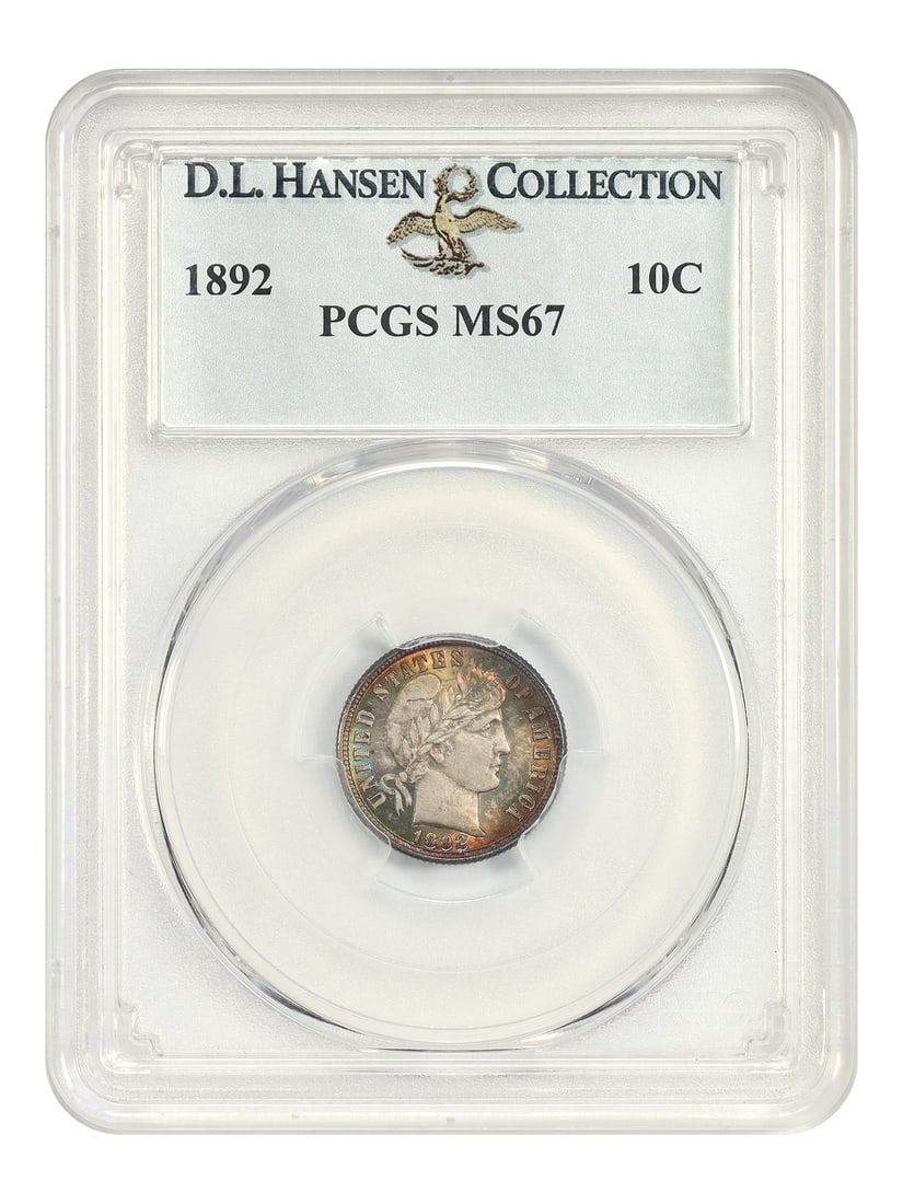 PCGS MS67 1892 Barber Dime 10C ex D.L. Hansen: PCGS MS67 1892 Barber Dime 10C ex D.L. Hansen 1892 Barber Dime certified by PCGS as MS67. This uncirculated example is described as a richly rainbow-toned first-year issue with multicolor toning conce