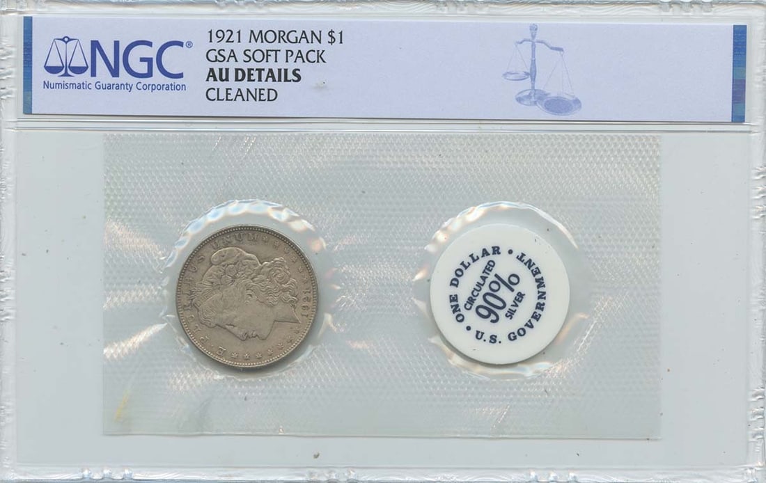 1921 Morgan Dollar GSA Soft Pack Silver Coin NGC AU Details: 1921 Morgan Dollar GSA Soft Pack Silver Coin NGC AU Details This 1921 Morgan Dollar comes in a GSA Soft Pack and has been authenticated and graded AU Details by NGC. The coin was minted in Philadelphi