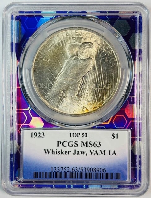 PCGS MS63 1923 Philadelphia Peace Dollar VAM 1A Whisker Jaw Variety: PCGS MS63 1923 Philadelphia Peace Dollar VAM 1A Whisker Jaw Variety This 1923 Peace Dollar is certified by PCGS with a grade of MS-63 and features the VAM 1A Whisker Jaw variety. Struck in silver at t