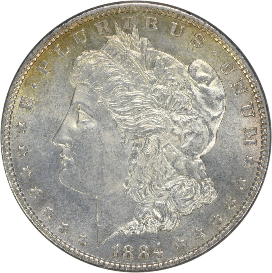 1884 Silver Morgan Dollar Brilliant Uncirculated Uncertified Coin: 1884 Silver Morgan Dollar Brilliant Uncirculated Uncertified Coin This is an uncirculated 1884 Morgan Silver Dollar from the United States, featuring brilliant uncirculated (BU) condition. The coin is