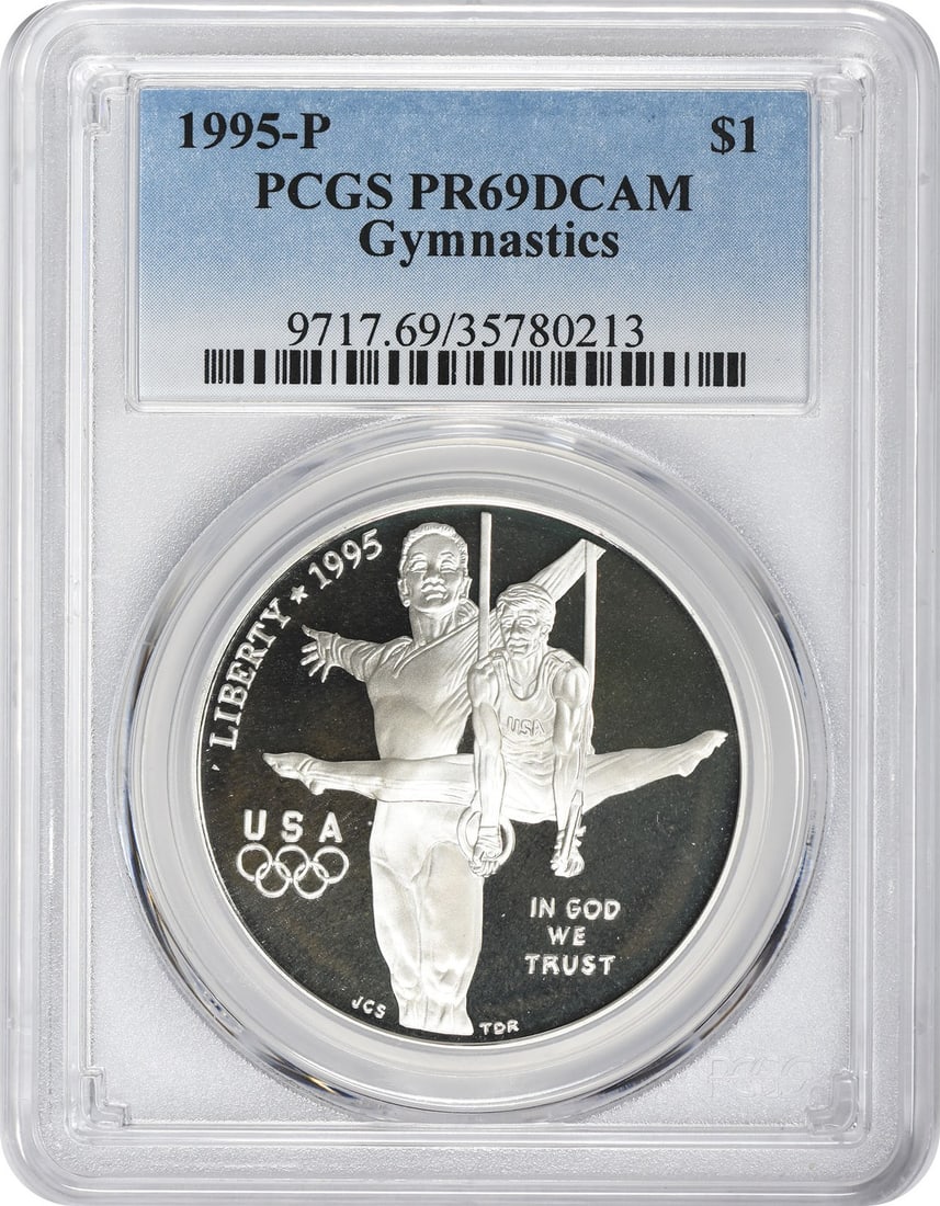 PCGS PR69DCAM 1995 P Olympic Gymnastics Silver Dollar: PCGS PR69DCAM 1995 P Olympic Gymnastics Silver Dollar This 1995-P Gymnastics Olympic Silver Commemorative Dollar is a proof coin graded PR69DCAM by PCGS. It features a commemorative design celebrating