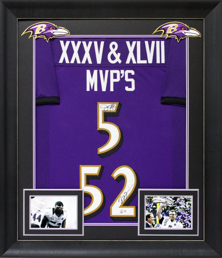 Framed Baltimore Ravens Jersey Signed by Ray Lewis and Joe Flacco BAS Witnessed: Framed Baltimore Ravens Jersey Signed by Ray Lewis and Joe Flacco BAS Witnessed This professionally framed purple pro style jersey features hand signatures from Ray Lewis and Joe Flacco of the Baltimo