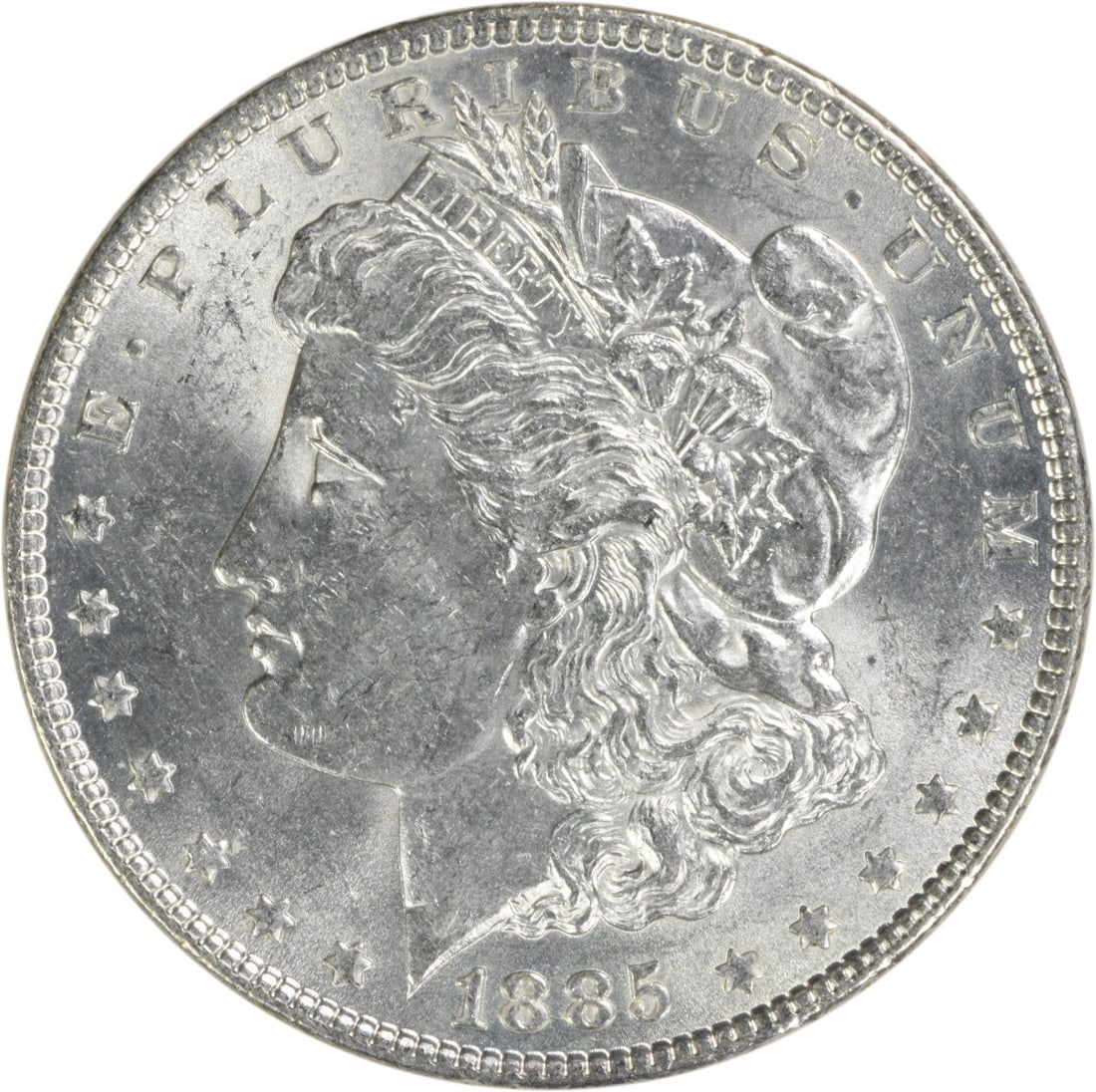 Uncirculated 1885 Morgan Silver Dollar Brilliant Uncertified US Coin: Uncirculated 1885 Morgan Silver Dollar Brilliant Uncertified US Coin This is an 1885 Morgan Silver Dollar from the United States, featuring a Brilliant Uncirculated (BU) grade. The coin is composed of