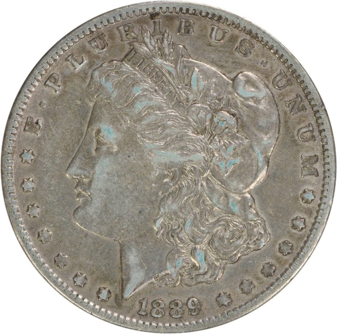 1889-O Morgan Silver Dollar EF Uncertified New Orleans Coin: 1889-O Morgan Silver Dollar EF Uncertified New Orleans Coin This 1889-O Morgan Silver Dollar showcases exquisite craftsmanship with a design by George T. Morgan. The coin is composed of 90% silver and