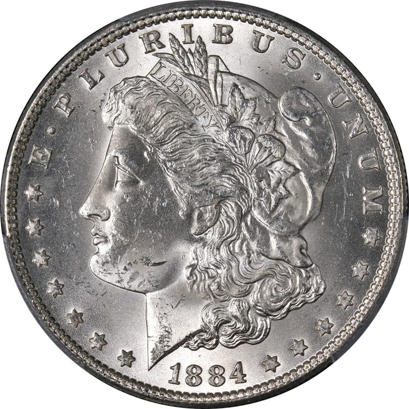PCGS MS64 1884 P Morgan silver dollar: PCGS MS64 1884 P Morgan silver dollar This 1884-P Morgan Silver Dollar is graded MS64 by PCGS, featuring bright white luster and a strong strike. The coin is composed of silver with a fineness of 0.9 