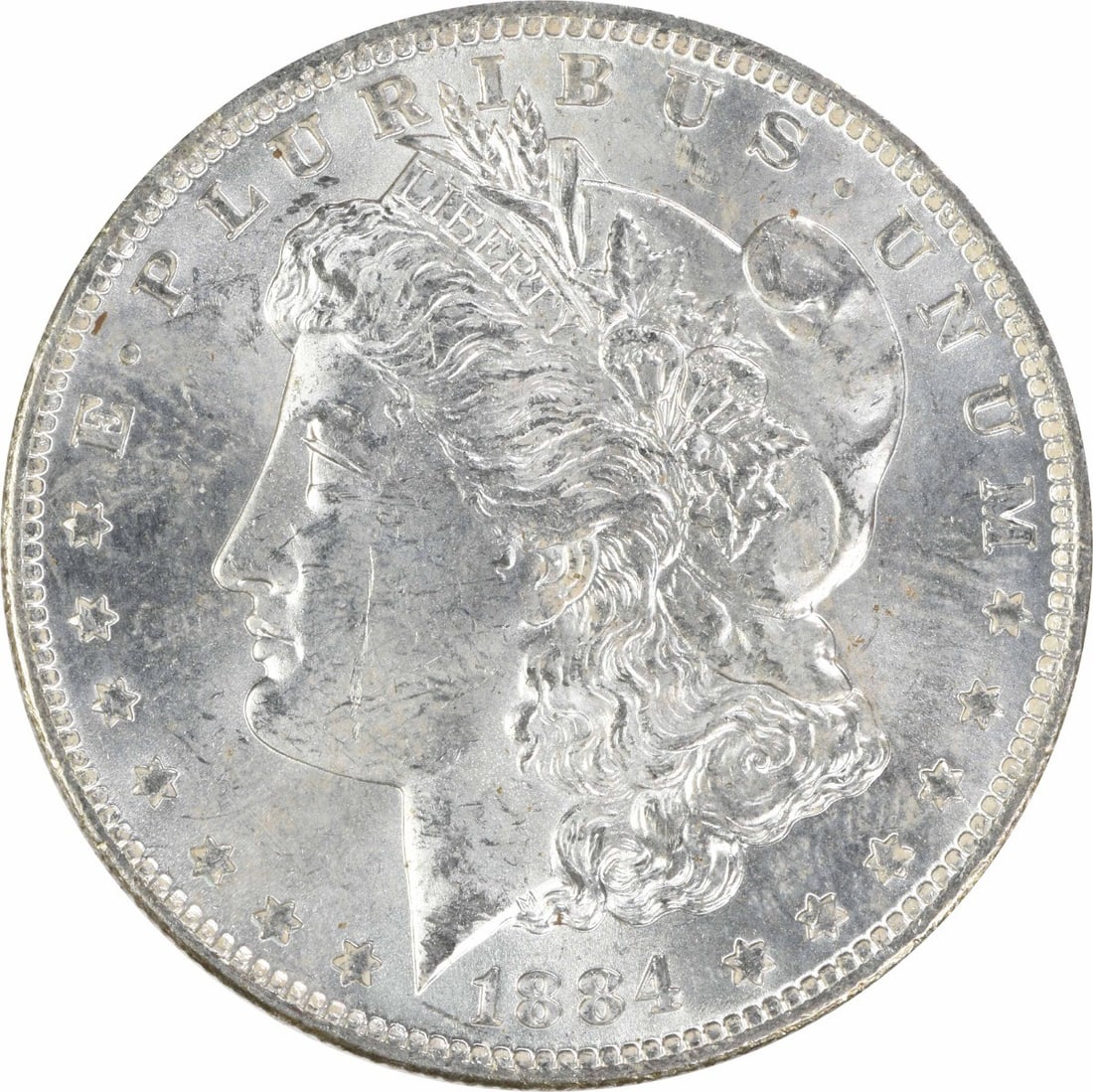 1884 O Morgan $1 Silver Coin Uncirculated Uncertified: 1884 O Morgan $1 Silver Coin Uncirculated Uncertified 1884-O Morgan Silver Dollar in uncirculated, uncertified condition. This pre-owned coin is composed of silver and carries an MS60 grade. Specifica