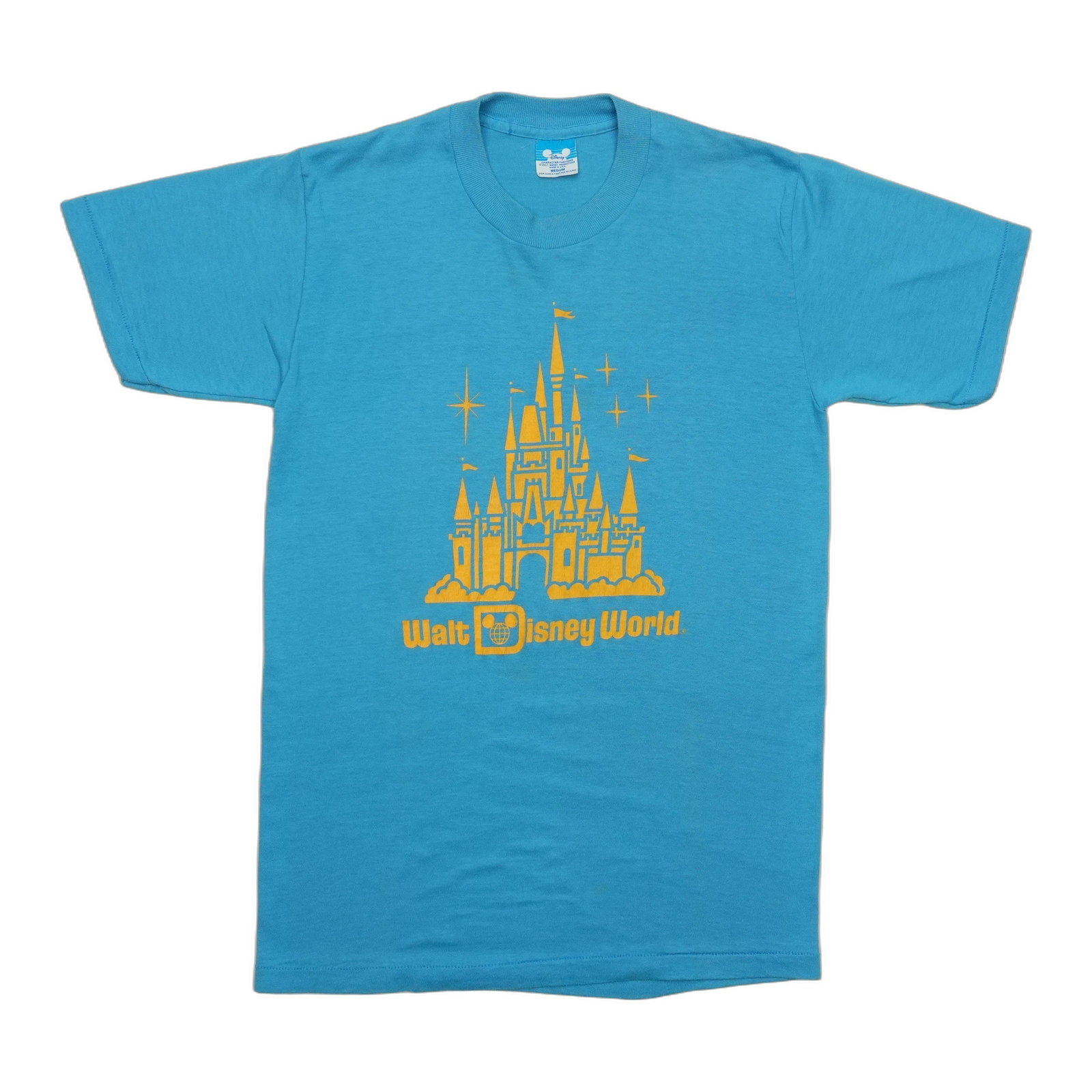 Vintage 1980s Blue Walt Disney World Castle Graphic Shirt: Vintage 1980s Blue Walt Disney World Castle Graphic Shirt This is an original vintage 1980s Walt Disney World Castle shirt featuring a front graphic design. Made from 100% cotton, it comes in blue and