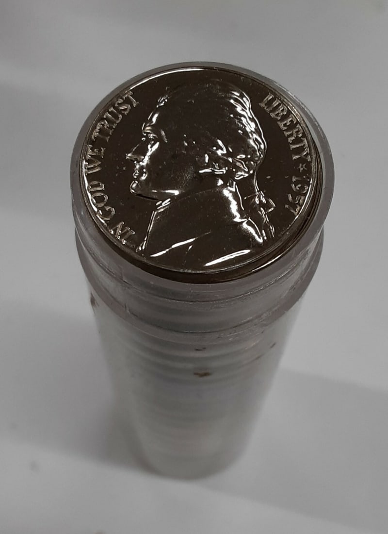 Roll of 40 1957 Jefferson Proof Nickels in Tube: Roll of 40 1957 Jefferson Proof Nickels in Tube This listing features a roll of forty 1957 Proof Jefferson Nickels from the United States, each housed in a tube. These uncirculated coins, struck at th
