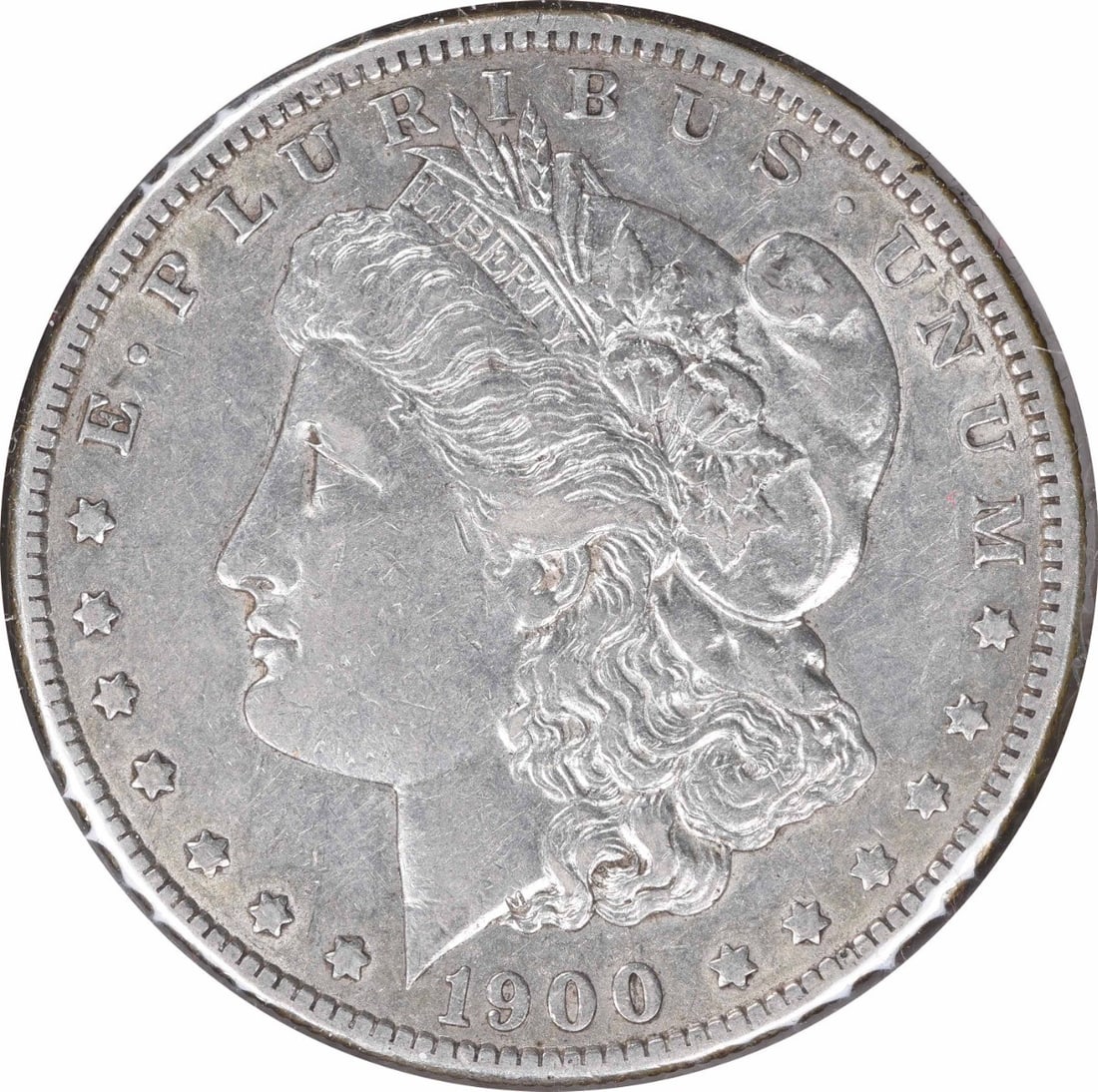 1900-O Morgan Silver Dollar George T Morgan Design Uncertified: 1900-O Morgan Silver Dollar George T Morgan Design Uncertified This 1900-O/CC Morgan Silver Dollar is a remarkable piece of numismatic history. Struck in 90% silver and 10% copper, this coin features 