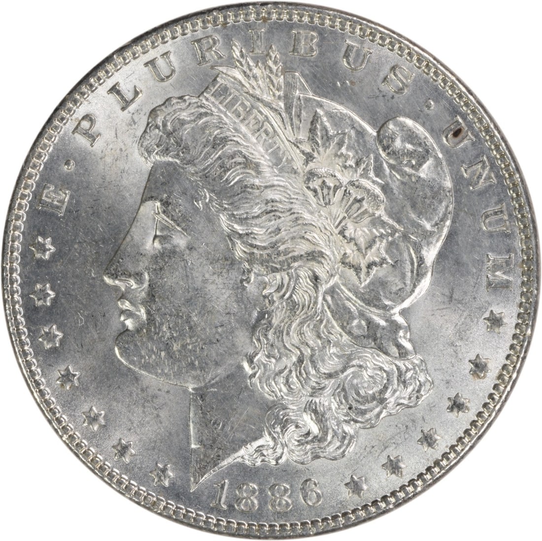 Choice BU 1886 Silver Dollar Morgan Uncertified No Mint Mark: Choice BU 1886 Silver Dollar Morgan Uncertified No Mint Mark This is an 1886 Morgan Silver Dollar from the United States, featuring a Choice Brilliant Uncirculated (BU) grade. The coin is composed of 