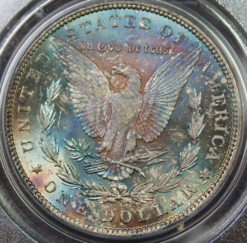 PCGS MS63 1887 Morgan Dollar Monster Toned: PCGS MS63 1887 Morgan Dollar Monster Toned This 1887 Morgan Silver Dollar was minted in Philadelphia and is certified by PCGS with a grade of MS-63. Struck in 0.9 fine silver, the coin remains uncircu