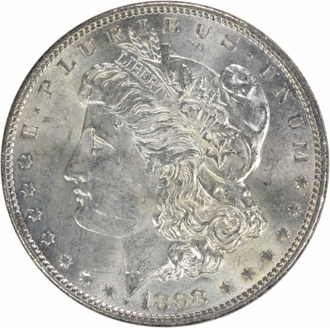 1898 Brilliant Uncirculated Morgan Silver Dollar Uncertified No Mint Mark: 1898 Brilliant Uncirculated Morgan Silver Dollar Uncertified No Mint Mark This 1898 Morgan Silver Dollar is an uncirculated coin with a Brilliant Uncirculated (BU) grade. It is composed of silver and 