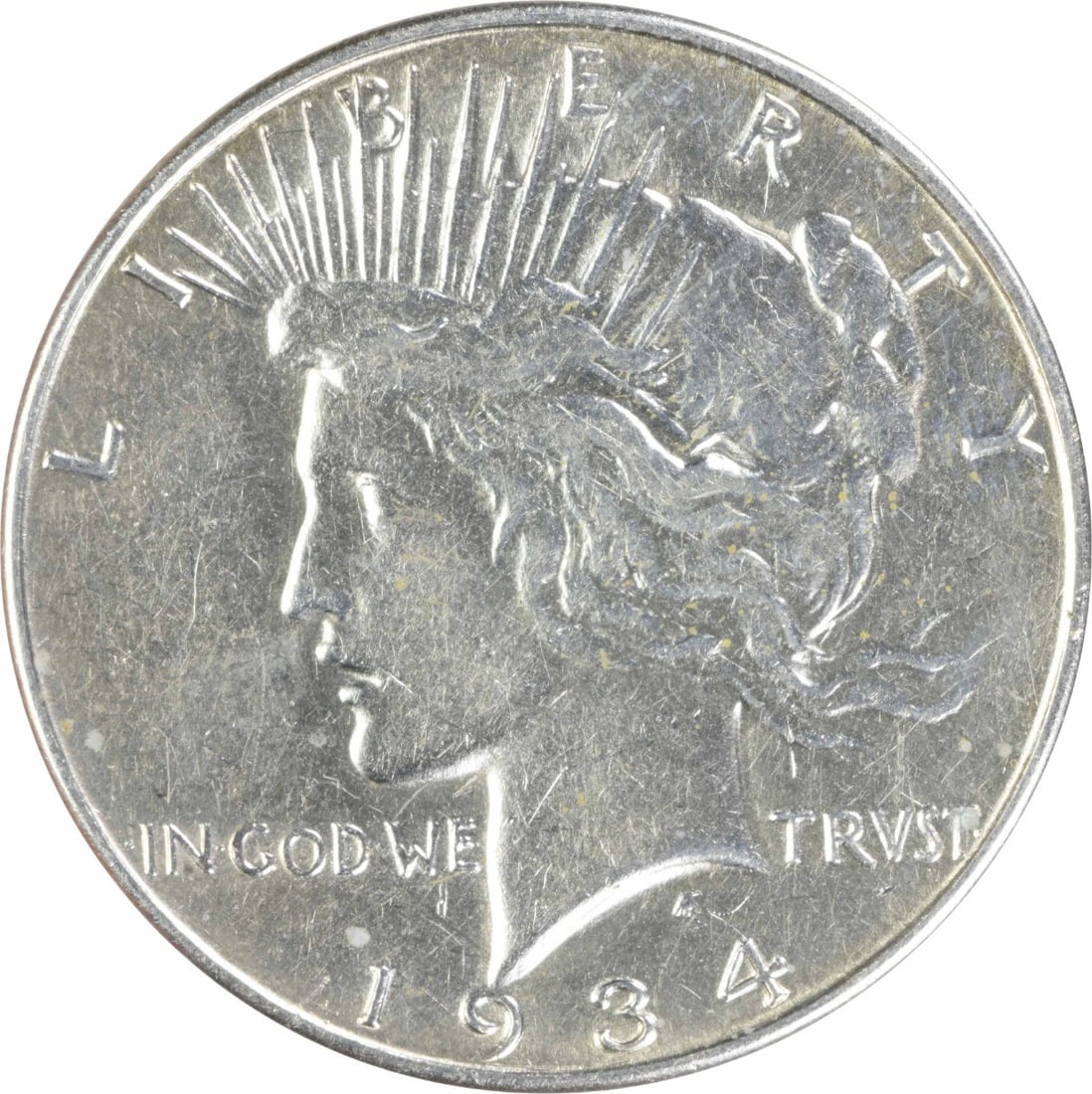 1934 $1 Peace Dollar Silver AU Circulated Uncertified: 1934 $1 Peace Dollar Silver AU Circulated Uncertified 1934 Peace Silver Dollar in About Uncirculated (AU) grade. This pre-owned coin is an uncertified, circulated example struck in silver and issued i