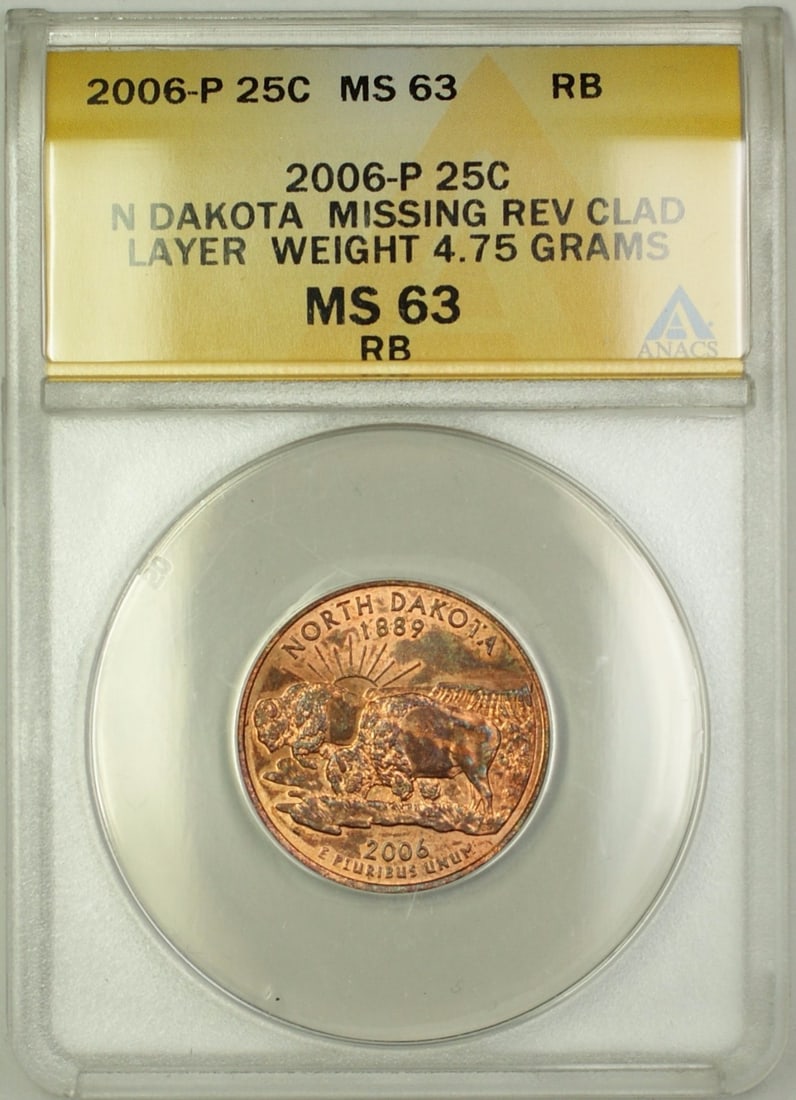 2006 North Dakota Quarter Error Coin ANACS MS-63 Missing Reverse Clad Layer: 2006 North Dakota Quarter Error Coin ANACS MS-63 Missing Reverse Clad Layer This is a 2006 North Dakota State Quarter coin featuring a rare error with the reverse clad layer missing. Graded MS 63 by A