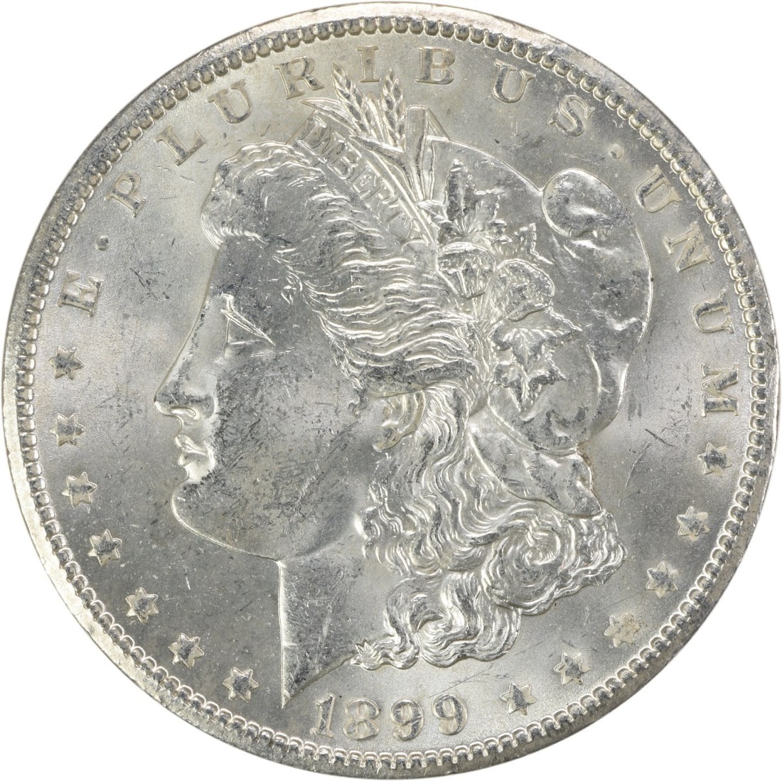 1899-O Uncirculated Morgan Dollar Silver Coin Uncertified BU: 1899-O Uncirculated Morgan Dollar Silver Coin Uncertified BU This is an uncirculated 1899-O Morgan Silver Dollar from the United States. The coin is composed of silver and features a brilliant uncircu