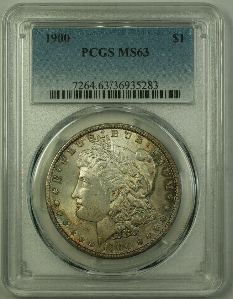 PCGS MS-63 Toned 1900 Morgan Dollar Silver Coin: PCGS MS-63 Toned 1900 Morgan Dollar Silver Coin This 1900 Morgan Silver Dollar is an uncirculated coin graded MS-63 by PCGS. Composed of 90% silver, it was minted in Philadelphia and features attracti
