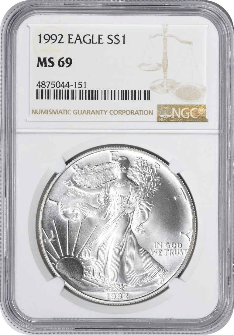 NGC MS69 1992 Silver American Eagle Dollar 1 oz Coin: NGC MS69 1992 Silver American Eagle Dollar 1 oz Coin This 1992 American Silver Eagle Dollar is graded MS69 by NGC and was minted at the U.S. Mint in San Francisco. It is composed of 99.93% silver and 