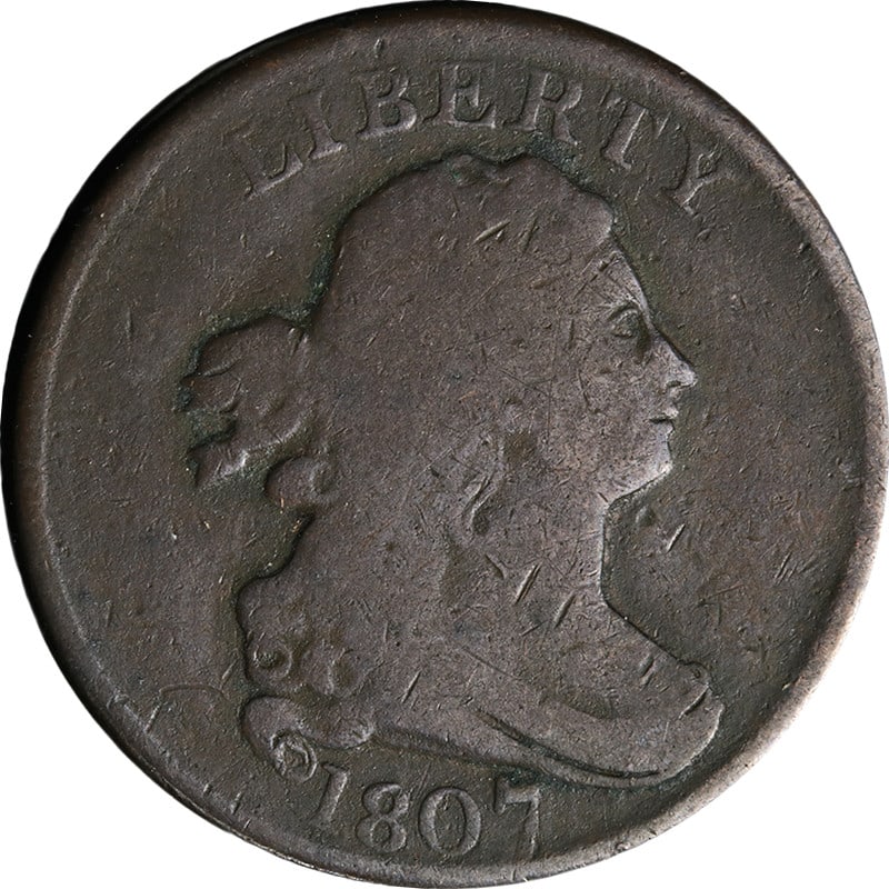 1807 United States Draped Bust Half Cent Copper VG C-1 R.2: 1807 United States Draped Bust Half Cent Copper VG C-1 R.2 Original 1807 Draped Bust Half Cent with a Draped Bust design. This circulated copper coin is described as Nice VG C-1 R.2, with nice eye app