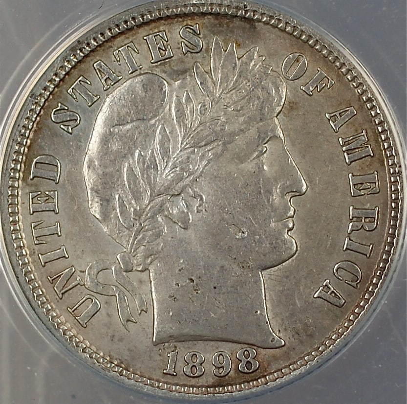 ANACS AU-55 1898 Barber silver dime Philadelphia: ANACS AU-55 1898 Barber silver dime Philadelphia This is an 1898 Barber Silver Dime graded AU-55 Details by ANACS. The coin is composed of silver and was minted in Philadelphia. It is noted as circula