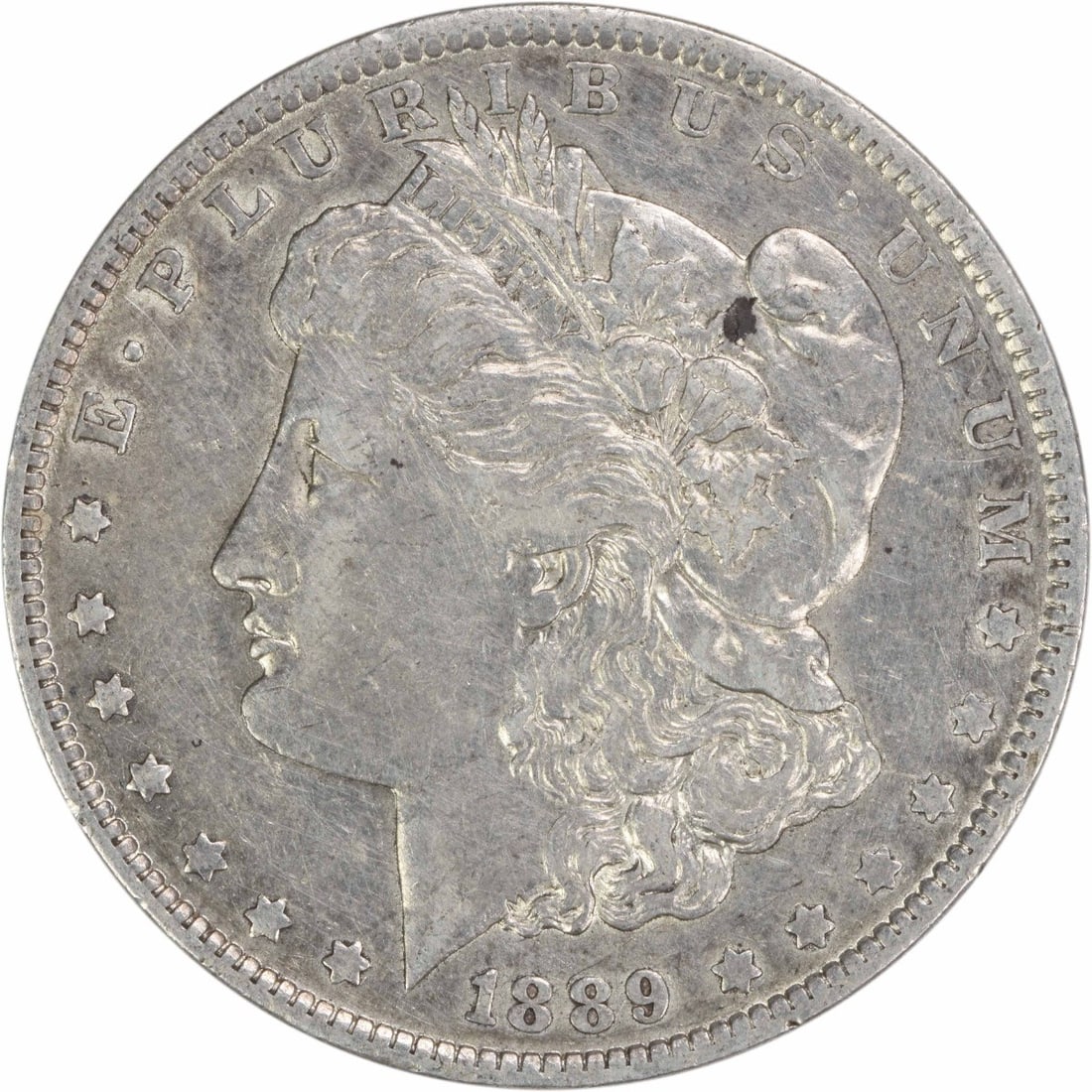 1889 New Orleans Morgan Dollar EF Grade 90 Percent Silver Uncertified: 1889 New Orleans Morgan Dollar EF Grade 90 Percent Silver Uncertified This 1889-O Morgan Silver Dollar is a circulated coin from the New Orleans mint. Designed by George T. Morgan, it is composed of 9