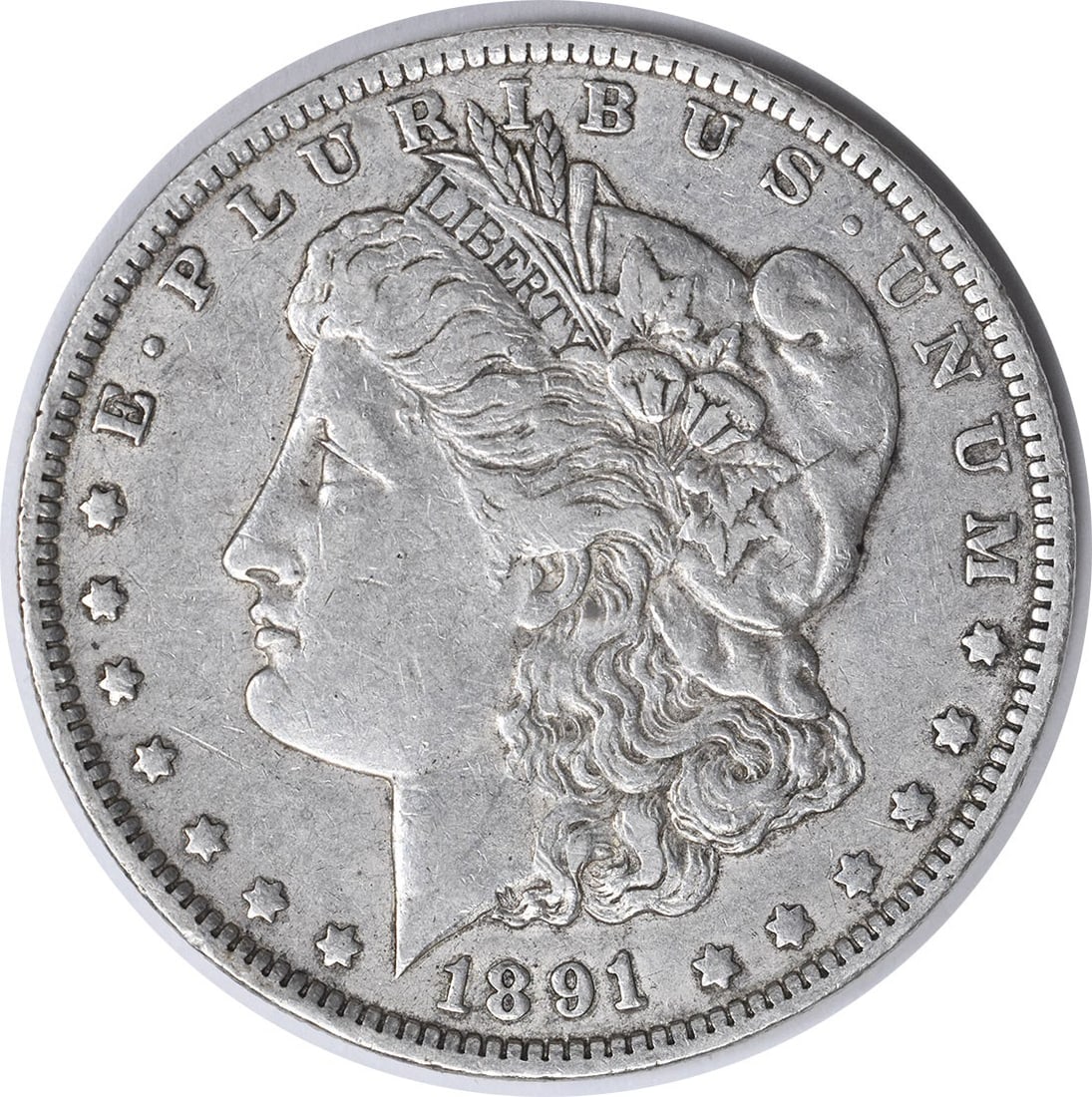 1891-O Morgan Silver Dollar XF Uncertified New Orleans Mint: 1891-O Morgan Silver Dollar XF Uncertified New Orleans Mint This 1891-O Morgan Silver Dollar is a remarkable piece of numismatic history. Struck at the New Orleans Mint, this coin features the iconic 