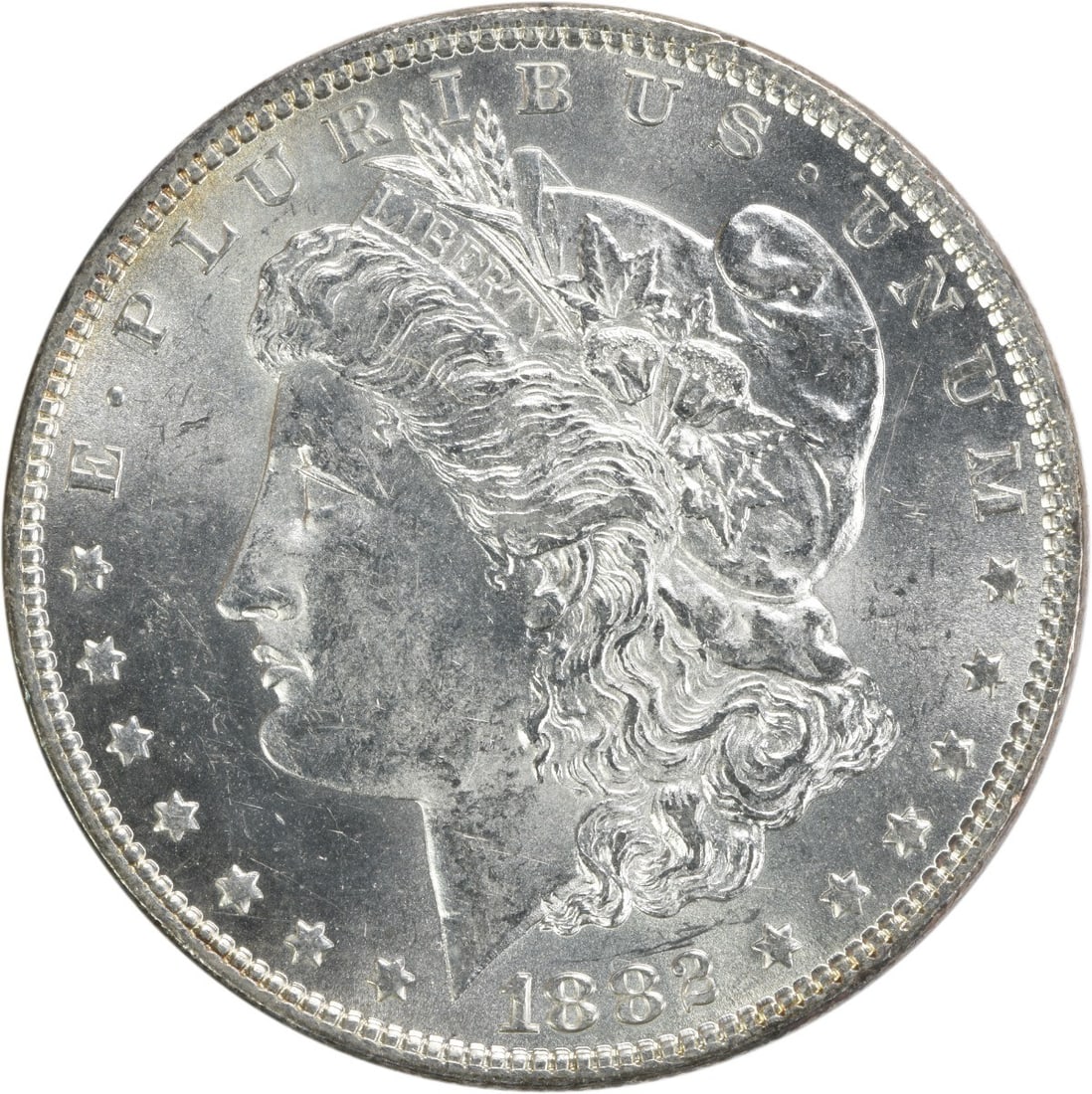 1882 Morgan Dollar Silver Coin Brilliant Uncirculated Uncertified: 1882 Morgan Dollar Silver Coin Brilliant Uncirculated Uncertified This is an 1882 Morgan Silver Dollar from the United States, featuring bright uncirculated condition. The coin is composed of silver, 
