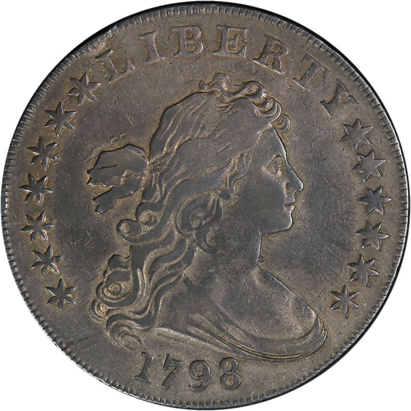 1798 Bust Dollar Silver Nice VF Details Graffiti Eye Appeal: 1798 Bust Dollar Silver Nice VF Details Graffiti Eye Appeal This 1798 Bust Dollar showcases nice eye appeal with a strong strike and vibrant color. The coin displays nice surfaces, although it has a r
