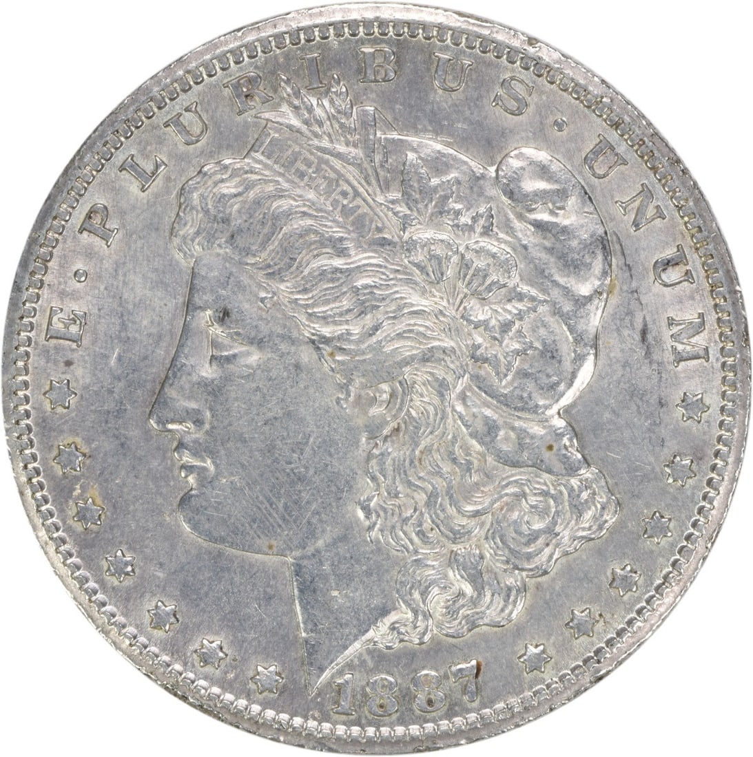 1887-S Morgan Silver Dollar AU Uncertified 90% Silver Coin: 1887-S Morgan Silver Dollar AU Uncertified 90% Silver Coin This 1887-S Morgan Silver Dollar showcases the exquisite design by George T. Morgan. Minted in San Francisco, this coin is composed of 90% si