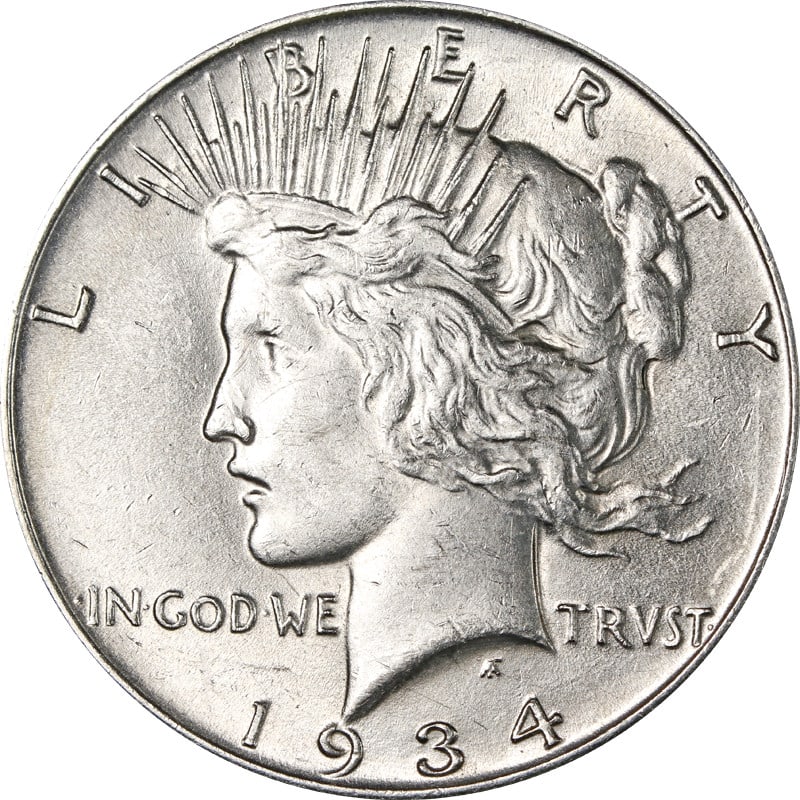 1934 Philadelphia Silver Peace Dollar: 1934 Philadelphia Silver Peace Dollar This is a 1934-P Peace Dollar from the United States, composed of 90% silver. The coin is circulated and comes uncertified. It is a pre-owned item minted in Phila