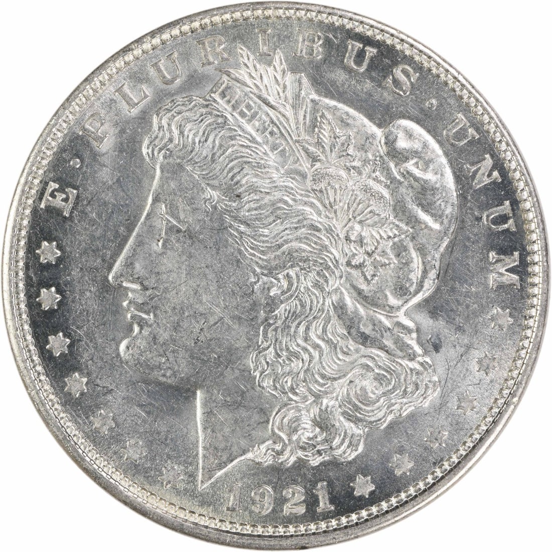 Uncirculated 1921 D Morgan Silver Dollar Brilliant Uncertified US Coin: Uncirculated 1921 D Morgan Silver Dollar Brilliant Uncertified US Coin This is a 1921-D Morgan Silver Dollar in Brilliant Uncirculated (BU) condition. The coin is uncertified and composed of silver, m