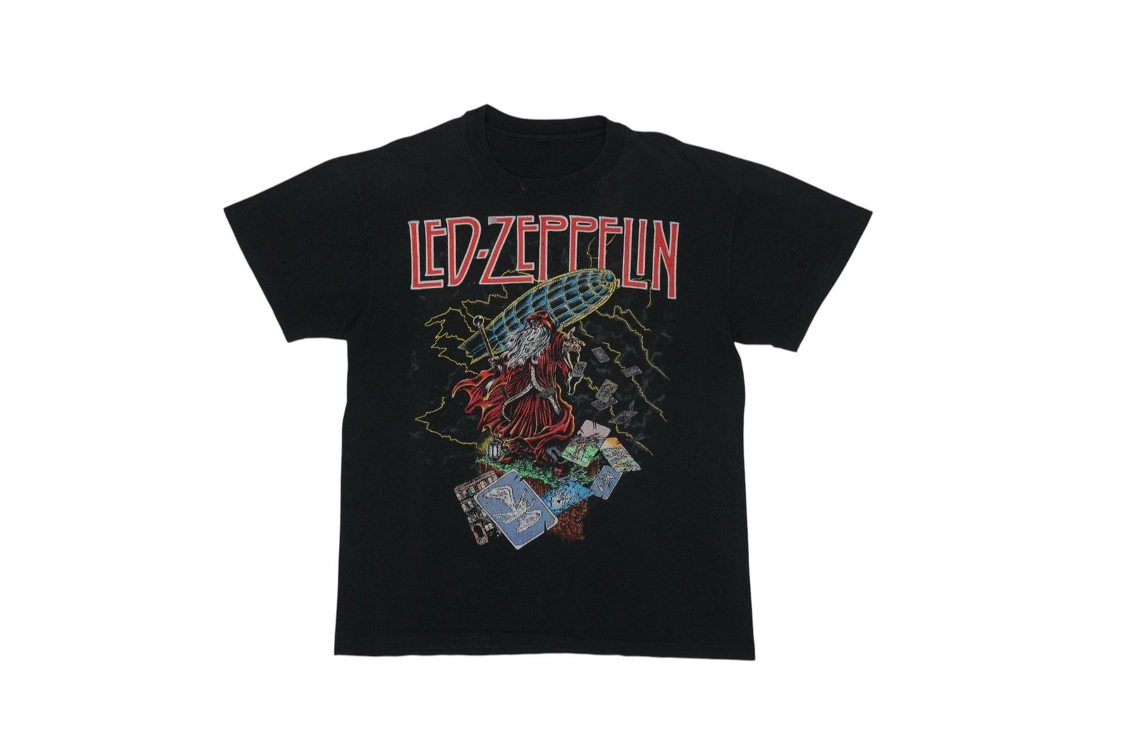 Vintage 1990s Led Zeppelin Zoso Black Cotton Graphic T Shirt: Vintage 1990s Led Zeppelin Zoso Black Cotton Graphic T Shirt This is an original vintage Led Zeppelin Zoso shirt from the 1990s, featuring front and back graphics. The shirt is constructed from 100% c