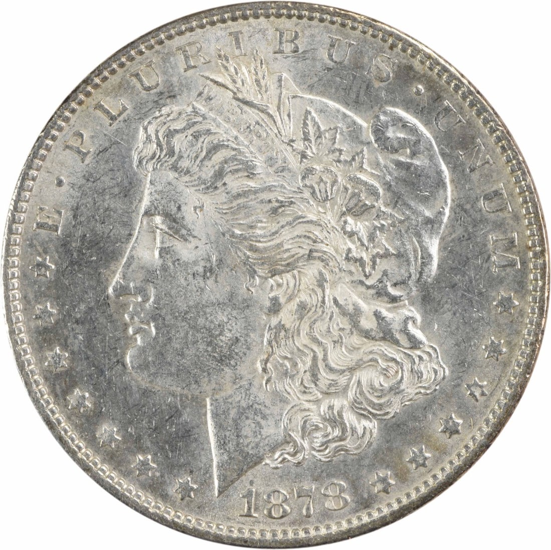 1878 Morgan Silver Dollar AU Uncertified 90% Silver Philadelphia Coin: 1878 Morgan Silver Dollar AU Uncertified 90% Silver Philadelphia Coin This 1878 Morgan Silver Dollar showcases the iconic design by George T. Morgan, featuring a beautiful depiction of Lady Liberty on