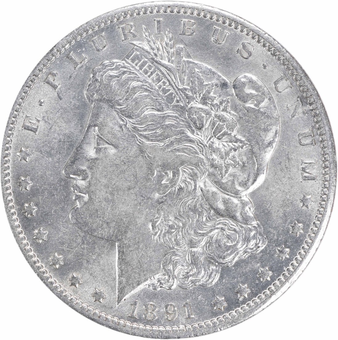 1891-O Morgan Silver Dollar AU Uncertified 90% Silver Coin: 1891-O Morgan Silver Dollar AU Uncertified 90% Silver Coin This 1891-O Morgan Silver Dollar is a stunning example of classic American coinage. Designed by George T. Morgan, this coin features a remark
