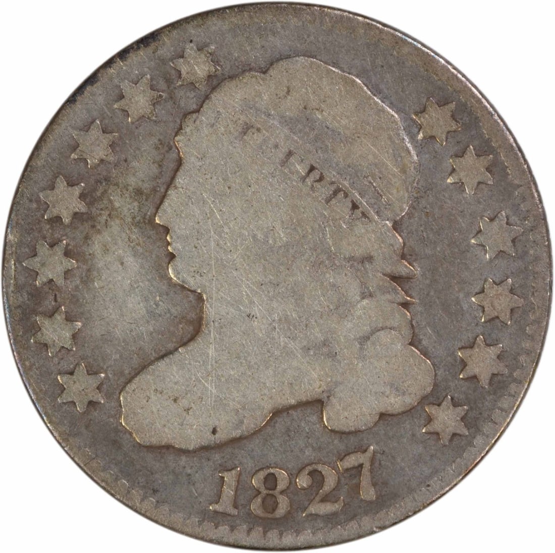 1827 Capped Bust Dime Philadelphia Mint Circulated Uncertified US Coin: 1827 Capped Bust Dime Philadelphia Mint Circulated Uncertified US Coin This is an 1827 Capped Bust silver dime from the United States, designed by John Reich. The coin is circulated and uncertified, f
