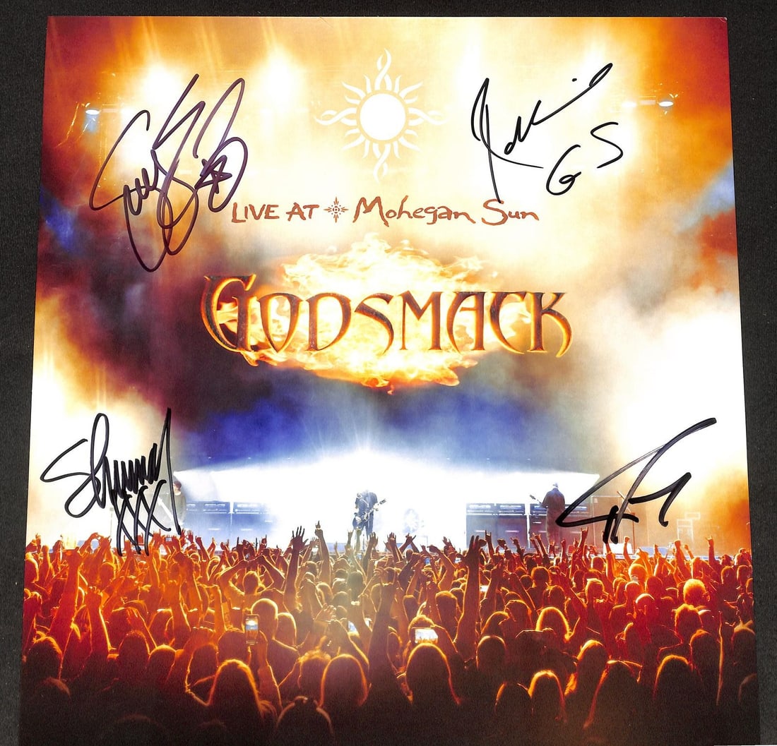 Beckett LOA Godsmack Live at Mohegan Sun signed album sleeve: Beckett LOA Godsmack Live at Mohegan Sun signed album sleeve This "Live at Mohegan Sun" album sleeve by Godsmack features the bold, hand-signed autographs of band members Sully Erna, Shannon Larkin, R