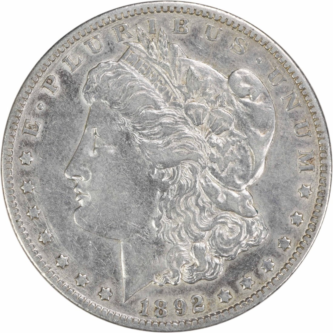 1892 New Orleans Morgan Dollar 90 Percent Silver Extra Fine Uncertified: 1892 New Orleans Morgan Dollar 90 Percent Silver Extra Fine Uncertified This 1892-O Morgan Silver Dollar is a circulated coin featuring the iconic design by George T. Morgan. Minted in New Orleans, th