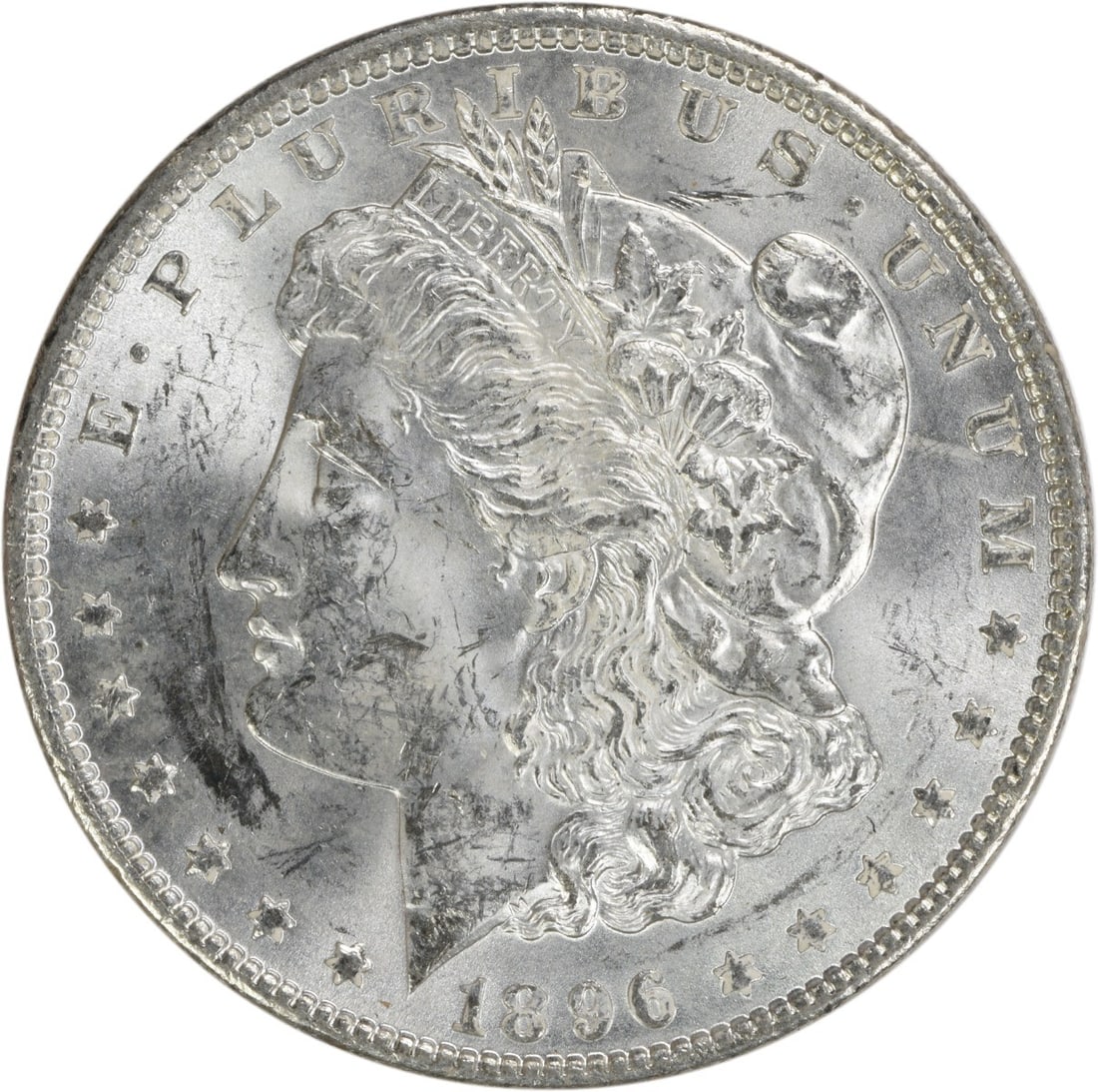 Uncirculated 1896 Silver Dollar Morgan Type Brilliant Uncertified Example: Uncirculated 1896 Silver Dollar Morgan Type Brilliant Uncertified Example This is an uncirculated 1896 Morgan Silver Dollar from the United States. The coin features the Morgan design and is composed 
