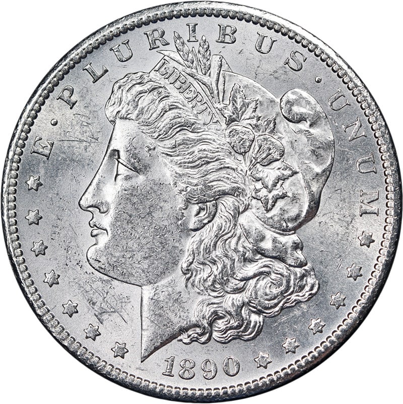 1890-S Morgan Silver Dollar Blast White BU: 1890-S Morgan Silver Dollar Blast White BU This 1890-S Morgan Silver Dollar is an uncirculated coin featuring bright, blast white surfaces and strong eye appeal. It displays a nice luster and sharp st