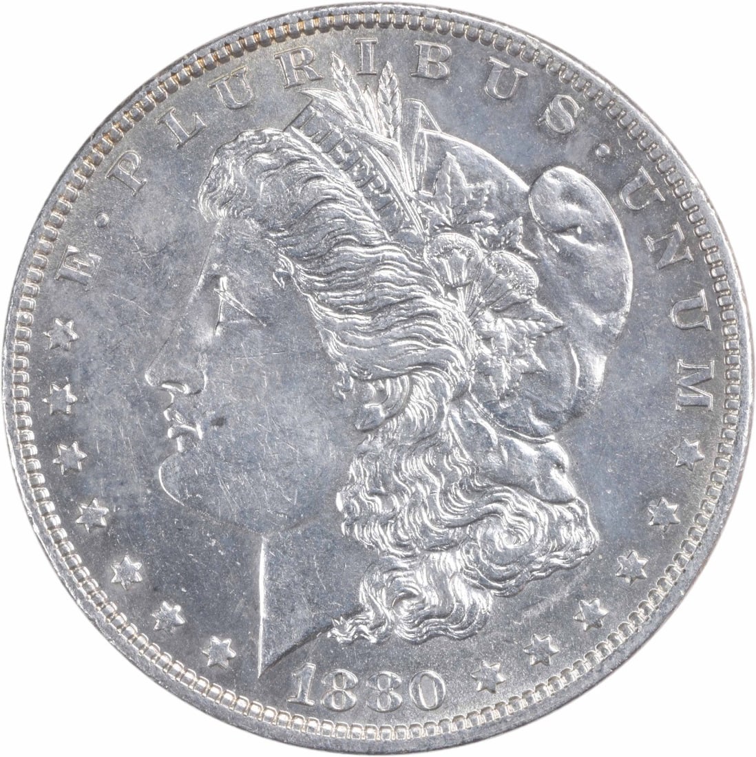 1880-O Morgan Silver Dollar AU Uncertified New Orleans Coin: 1880-O Morgan Silver Dollar AU Uncertified New Orleans Coin This 1880-O Morgan Silver Dollar is a classic piece of American numismatic history, featuring a design by George T. Morgan. The coin is comp