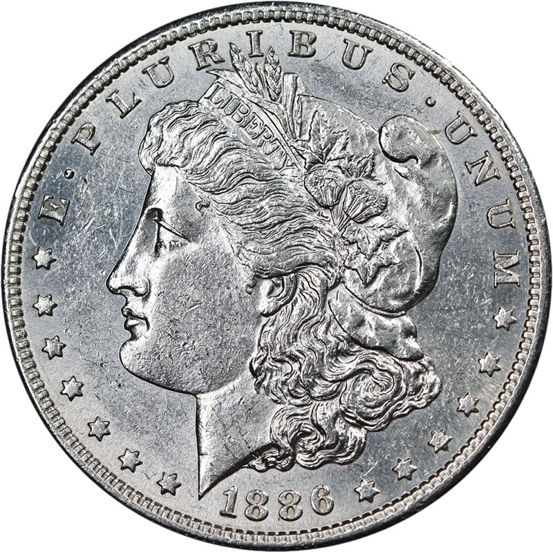 1886 S Morgan Silver Dollar Uncirculated BU+ Bright White: 1886 S Morgan Silver Dollar Uncirculated BU+ Bright White 1886-S Morgan Silver Dollar with nice eye appeal, bright white color, nice luster, and a nice strike. This pre-owned coin is described as unci