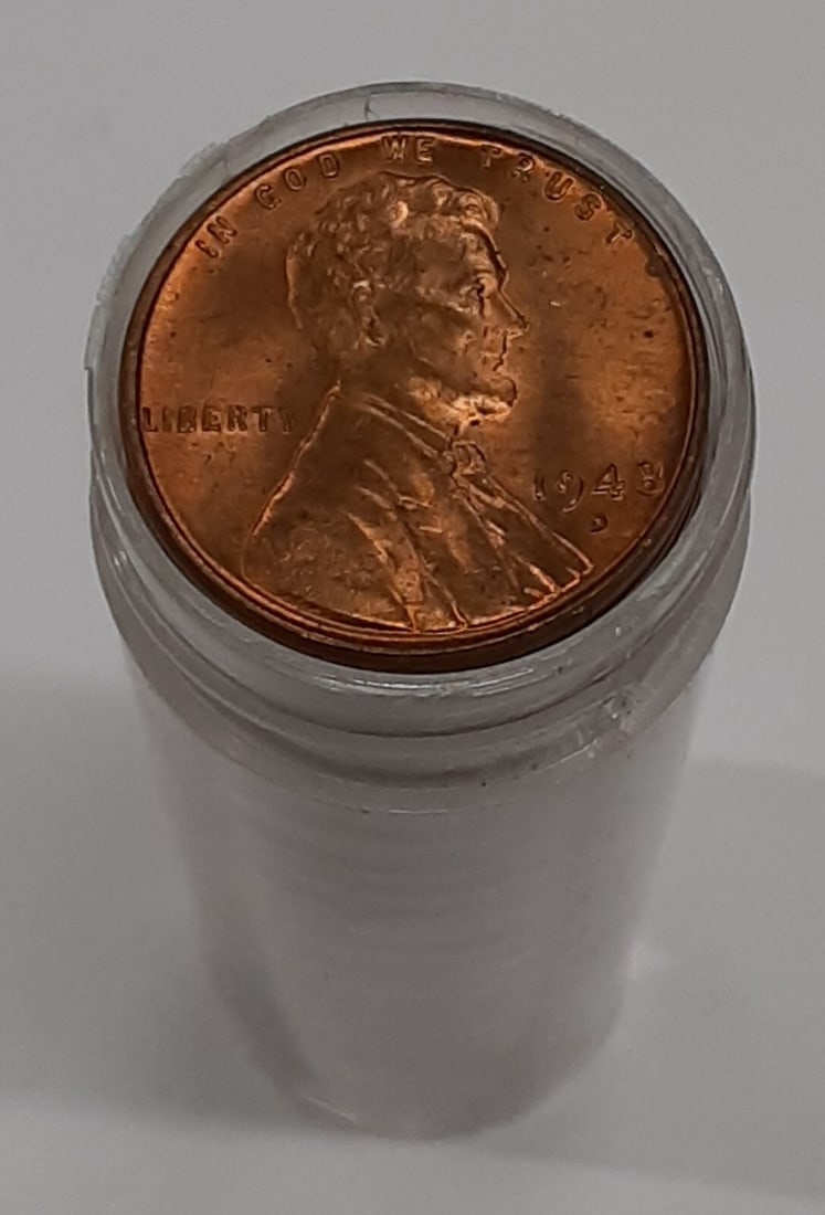 Roll of 50 Uncirculated 1948-D Lincoln Wheat Cents in Tube Toned: Roll of 50 Uncirculated 1948-D Lincoln Wheat Cents in Tube Toned This listing features a roll of fifty uncirculated 1948-D Lincoln Wheat cents, housed in a coin tube. Each coin is composed of copper a