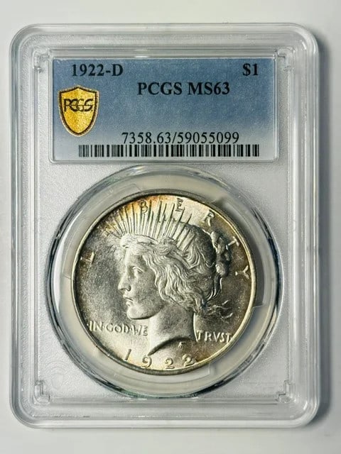 PCGS MS 63 1922 D Peace Silver Dollar: PCGS MS 63 1922 D Peace Silver Dollar 1922-D Peace Dollar certified by PCGS and graded MS 63. This silver one dollar coin is a pre-owned piece struck in the United States. Specifications Item Type: Pe