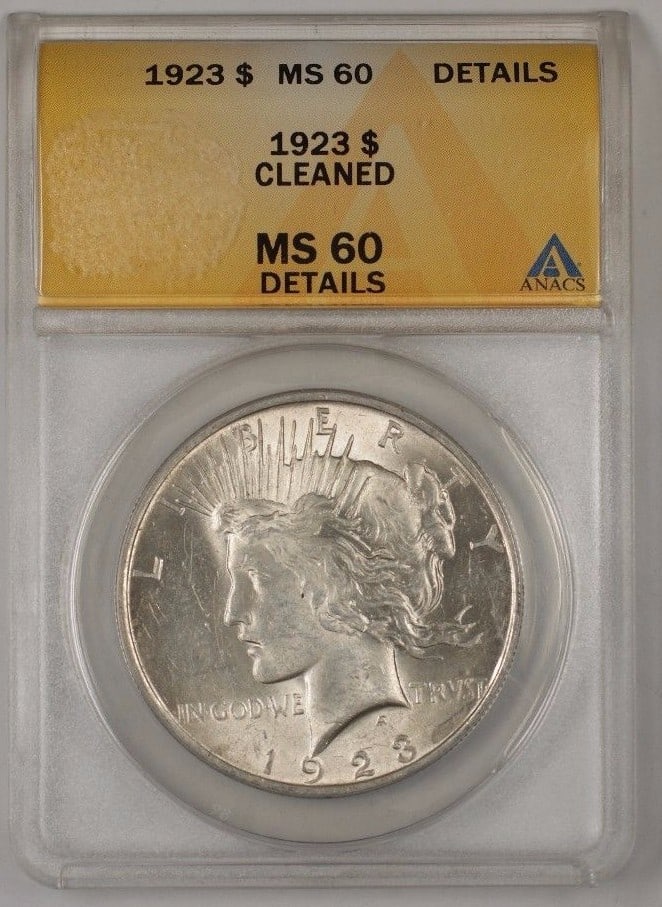 Two 1923 Peace Silver Dollars ANACS MS-60 Details Cleaned Philadelphia Mint: Two 1923 Peace Silver Dollars ANACS MS-60 Details Cleaned Philadelphia Mint This is a 1923 Peace Silver Dollar coin from the United States, certified by ANACS with a grade of MS-60 Details. The coin i