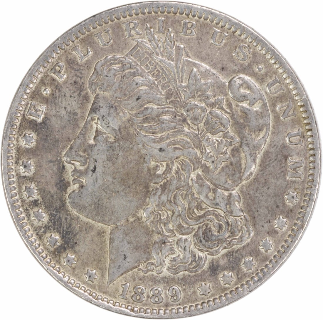 Morgan Dollar 1889 O Extra Fine 90 Percent Silver Uncertified US Coin: Morgan Dollar 1889 O Extra Fine 90 Percent Silver Uncertified US Coin This 1889-O Morgan Silver Dollar is a circulated coin from the United States, minted in New Orleans. Struck in 90% silver and 10% 