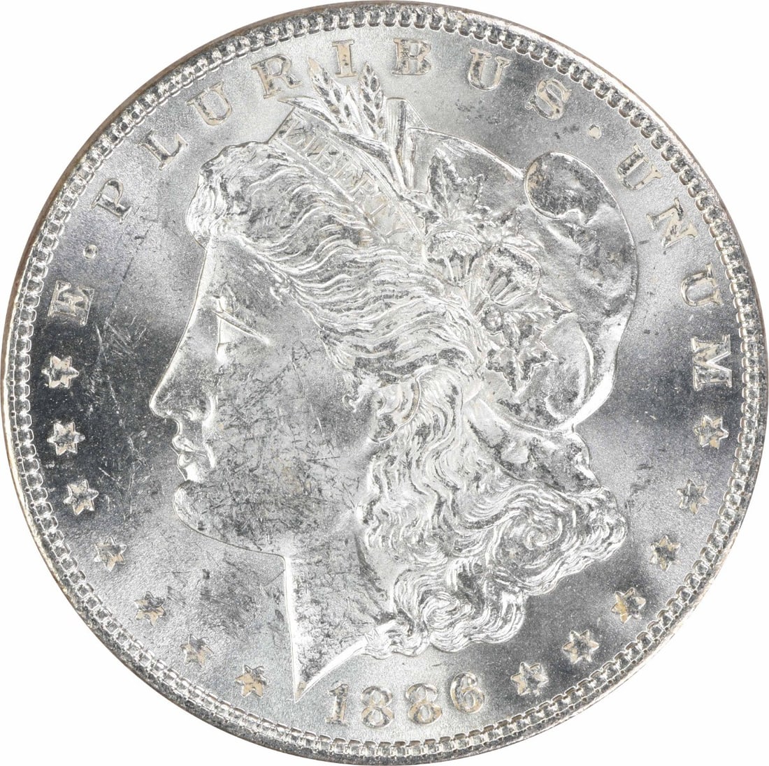 1886 Uncirculated Morgan Silver Dollar $1 Uncertified: 1886 Uncirculated Morgan Silver Dollar $1 Uncertified 1886 Morgan Silver Dollar in uncirculated, pre-owned condition. This uncertified coin is composed of silver and carries a grade of MS60. Specifica