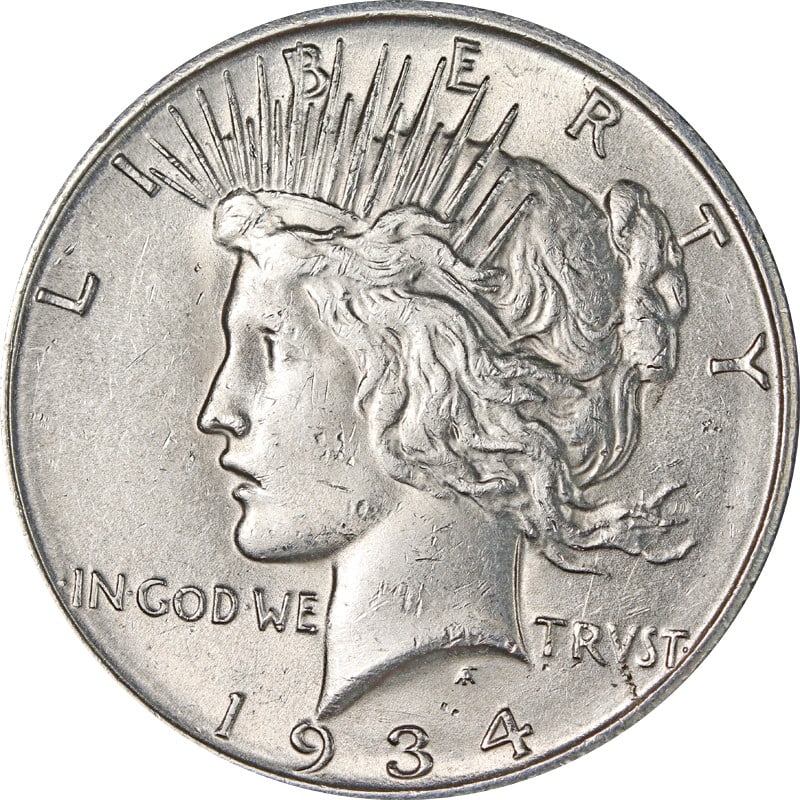 1934 Denver Mint Silver Peace Dollar United States Coin: 1934 Denver Mint Silver Peace Dollar United States Coin This is a 1934-D Peace Dollar from the United States, composed of 90% silver. The coin was minted in Denver and is in circulated, pre-owned cond
