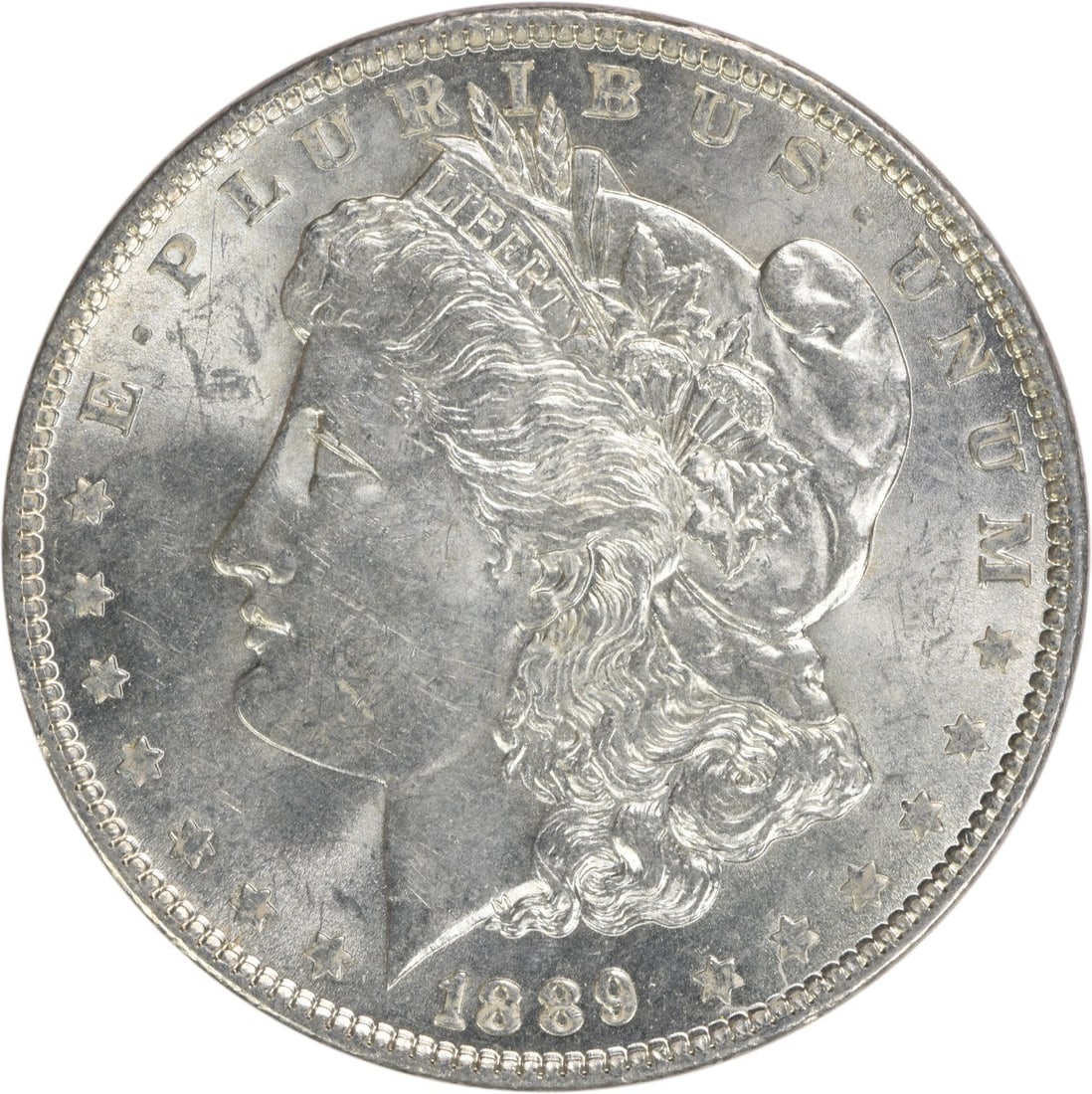 Uncirculated 1889 Silver Dollar Morgan Type BU Grade No Mint Mark: Uncirculated 1889 Silver Dollar Morgan Type BU Grade No Mint Mark This 1889 Morgan Silver Dollar is an uncirculated, brilliant uncirculated (BU) coin from the United States. It is composed of silver, 