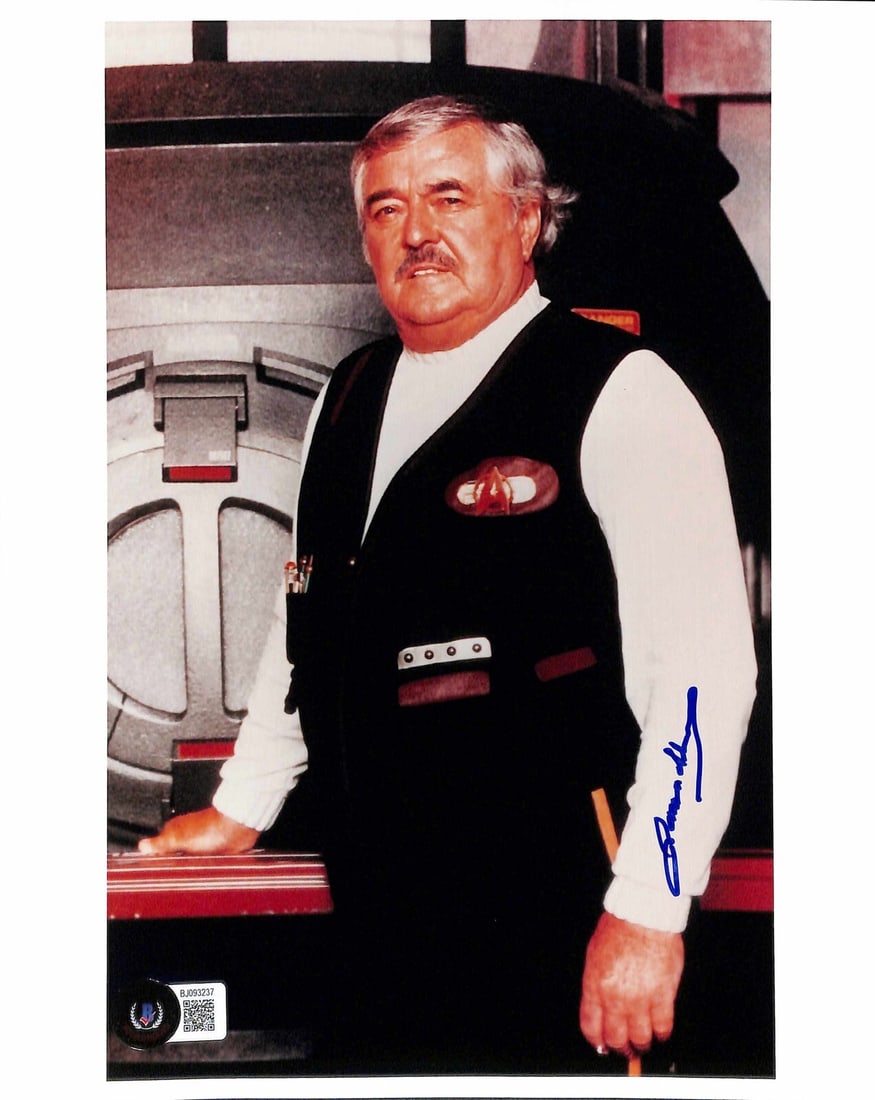 James Doohan Scotty Signed 8x10 Photo Beckett Certified: James Doohan Scotty Signed 8x10 Photo Beckett Certified This is an original 8x10 autographed photograph of James Doohan, famously known as "Scottie" from Star Trek. The photograph features Doohan's si