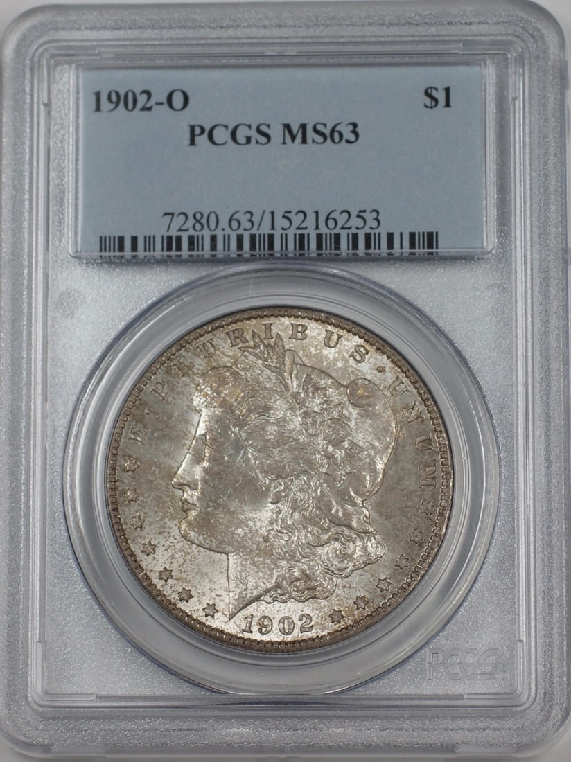 PCGS MS63 1902-O Toned Morgan Silver Dollar Coin from New Orleans Mint: PCGS MS63 1902-O Toned Morgan Silver Dollar Coin from New Orleans Mint This is a 1902-O Morgan Silver Dollar $1 coin, certified by PCGS with a grade of MS 63. The coin is uncirculated and features nat